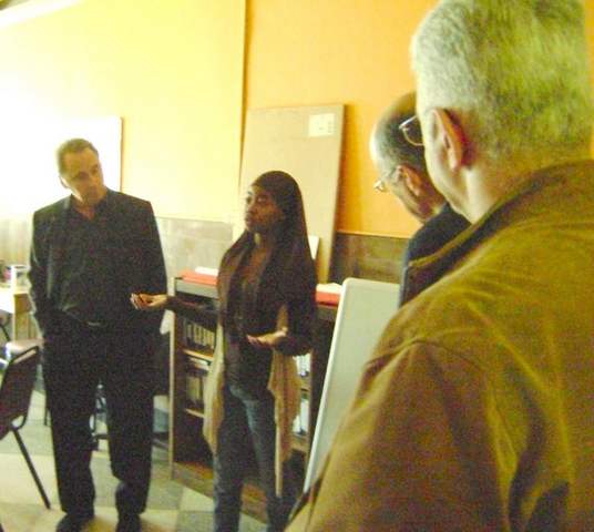 Howie Harris listens with rapt attention