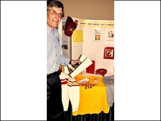 Allen Hirsh checks over the 214 memorabilia