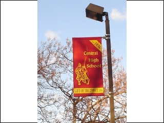 A close-up of the light shanchions and the CHS Banner